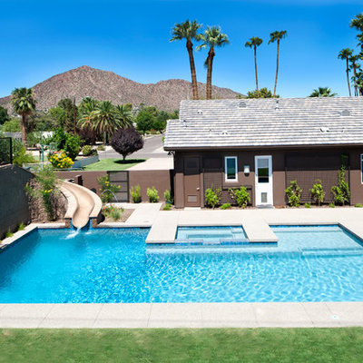 Example of a mid-sized trendy backyard concrete paver and rectangular water slide design in Phoenix