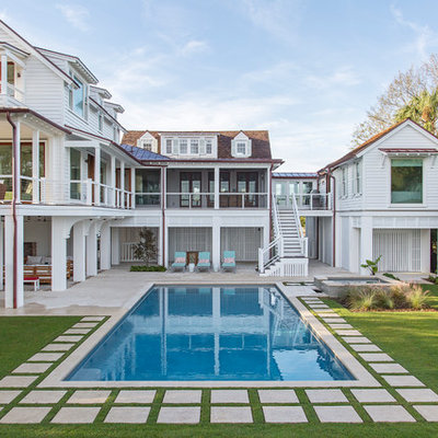 Inspiration for a large coastal backyard stone and rectangular pool remodel in Charleston