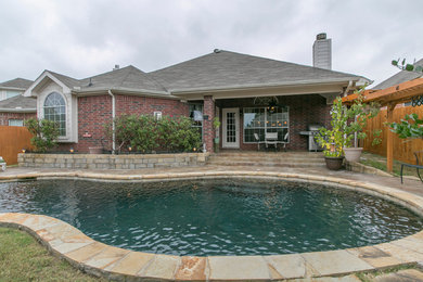 Transitional pool photo in Dallas