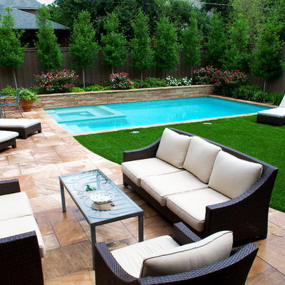Inspiration for a small transitional backyard stone and rectangular hot tub remodel in Dallas
