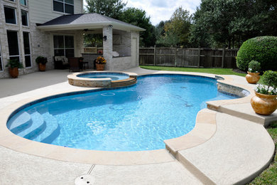 Design ideas for a rustic swimming pool in Houston.