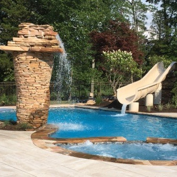 Beach Entry Pool with Cascading Water Feature & Slide