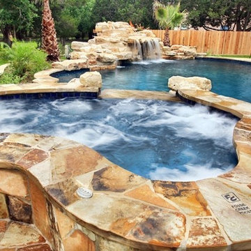 Beautiful spa with flagstone coping overlooking the pool