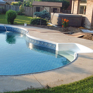 Before Photo of a Pool Concrete Surroundings.