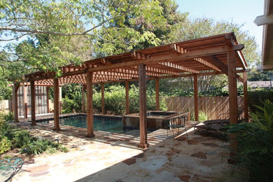 Example of a beach style pool design in Austin
