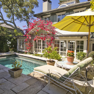 Example of a small classic backyard stone and rectangular pool design in San Francisco