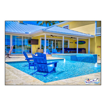 Bennett Nokomis, FL Custom Court Yard Swimming Pool & Spa With Raise Beach Area.