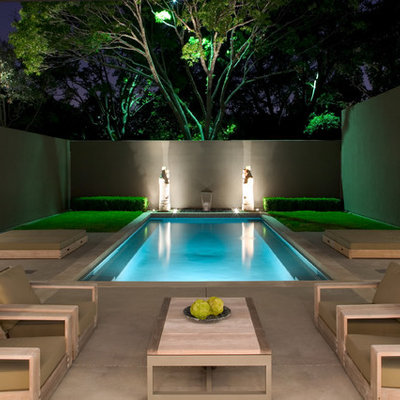 Pool - contemporary courtyard concrete and rectangular pool idea in Dallas