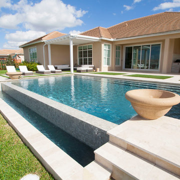 Big Pool with Infinity Edge and Custom Water Bowls in Davie, Florida