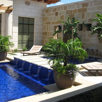 Blue glass tile swimming pool