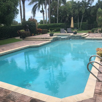 Boca Remodel, New pool finish, tile,coping, and sun shelf