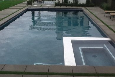 Example of a mid-sized classic backyard tile and rectangular lap pool design in Los Angeles