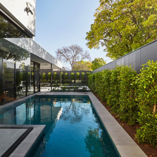 This is an example of a contemporary l-shaped pool in Melbourne.