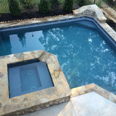 Small arts and crafts backyard custom-shaped natural pool photo in Atlanta with decking