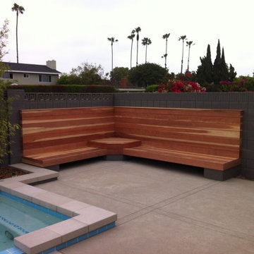 Built in wood bench near pool