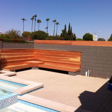 Built in wood bench near pool
