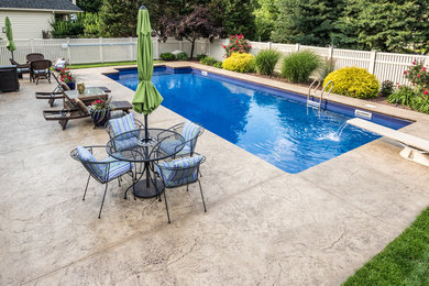 Elegant rectangular pool photo in Other