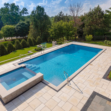 Burr Ridge Lap Pool with Raised Hot Tub and Waterfall