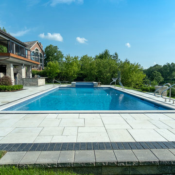 Burr Ridge Lap Pool with Raised Hot Tub and Waterfall