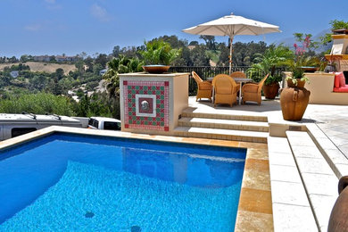 Design ideas for a mediterranean swimming pool in Santa Barbara.