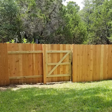 Cedar Deck with Fortress Railing & Cedar Good-Neighbor Fence