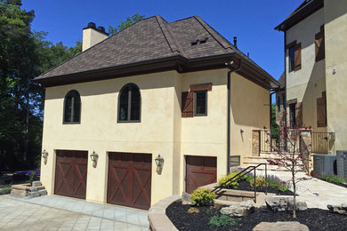 Example of a large tuscan backyard stone and rectangular natural pool house design in Charlotte