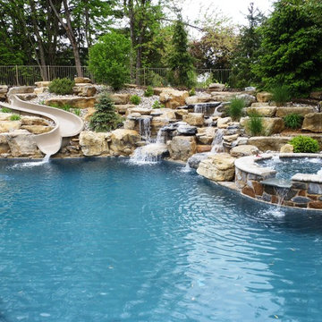 City of Allentown custom salt water pool with spa, slide, sunshelf, & waterfall