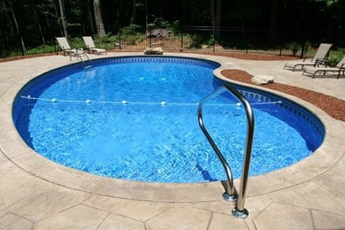 Inspiration pour une piscine en forme de haricot.