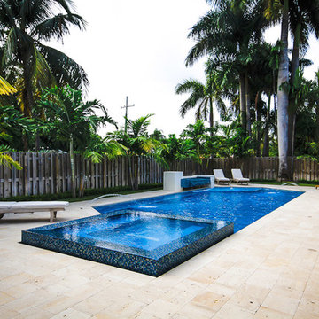 Classic/Straight Edge Pool With Custom Spa, Fountain and Sun Shelf in Miami, Fl