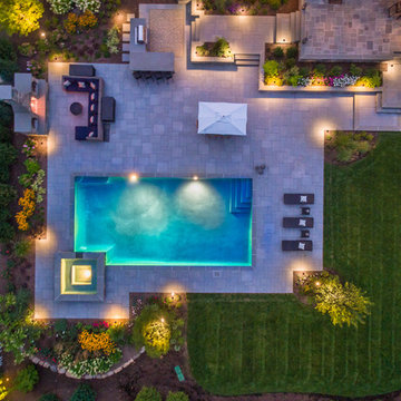 Clean line contemporary swimming pool and outdoor living area Wyckoff NJ