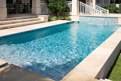 Beach style pool photo in Miami
