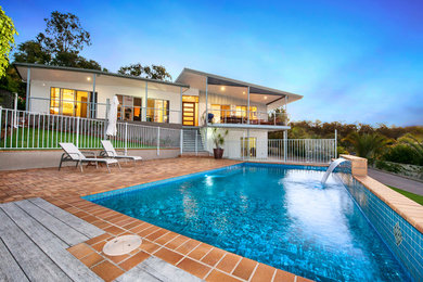 This is an example of a contemporary swimming pool in Gold Coast - Tweed.