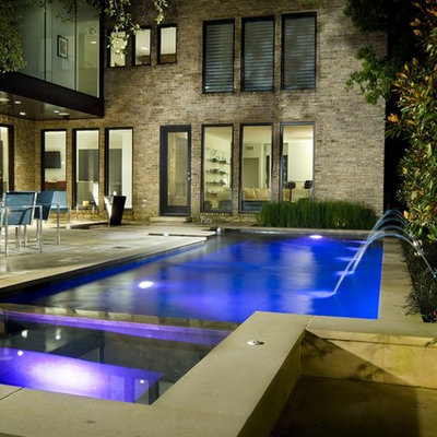 Pool - contemporary rectangular pool idea in Dallas