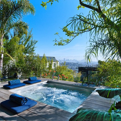 Example of a trendy hot tub design in San Francisco with decking
