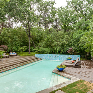 Inspiration for a contemporary pool in Dallas with decking.