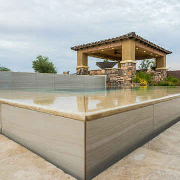 Contemporary Pool with Infinity Edge Spa