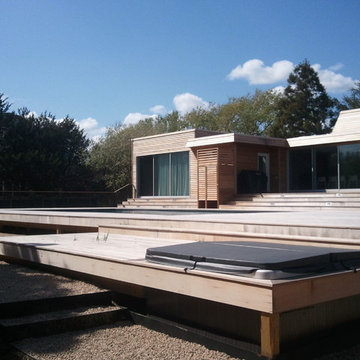 Contemporary with Wood Decking Throughout