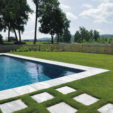 COUNTRY: simple rectangle swimming pool with granite + grass surround