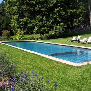 COUNTRY: simple rectangular swimming pool + grass surround
