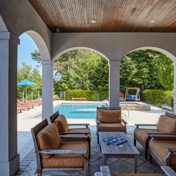 Covered Patio with Arched Openings By the Pool