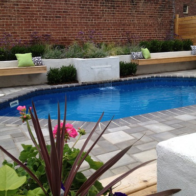 Pool fountain - mid-sized mediterranean backyard concrete paver and custom-shaped lap pool fountain idea in Richmond