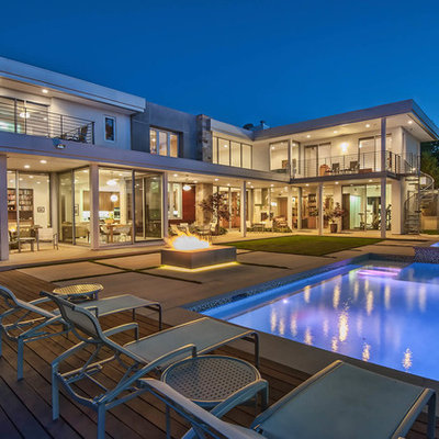 Example of a trendy backyard rectangular lap pool design in Los Angeles