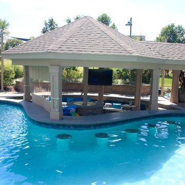 Custom Freeform Pool with Swim Up Bar and Waterslide