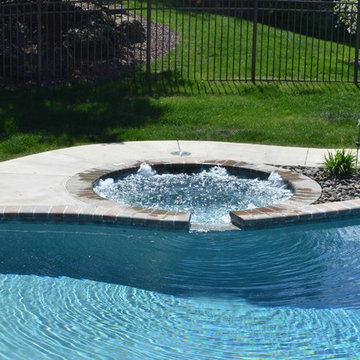 Custom Freeform style salt water inground pool with Spa