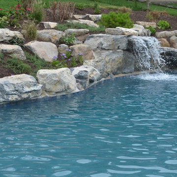 Custom Freeform style salt water pool with waterfall