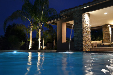Pool - contemporary custom-shaped pool idea in Phoenix