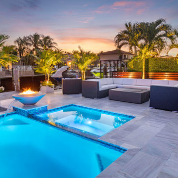 Custom Pool & Spa With Water and Fire Bowls in Pompano Beach