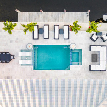 Custom Pool & Spa With Water and Fire Bowls in Pompano Beach