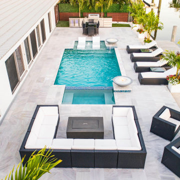 Custom Pool & Spa With Water and Fire Bowls in Pompano Beach
