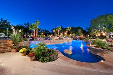 Inspiration for a large transitional backyard concrete and custom-shaped pool fountain remodel in Austin